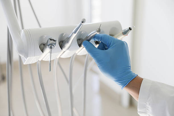 Professional Invisalign Clear Aligners technician working in Farmingdale, NJ
